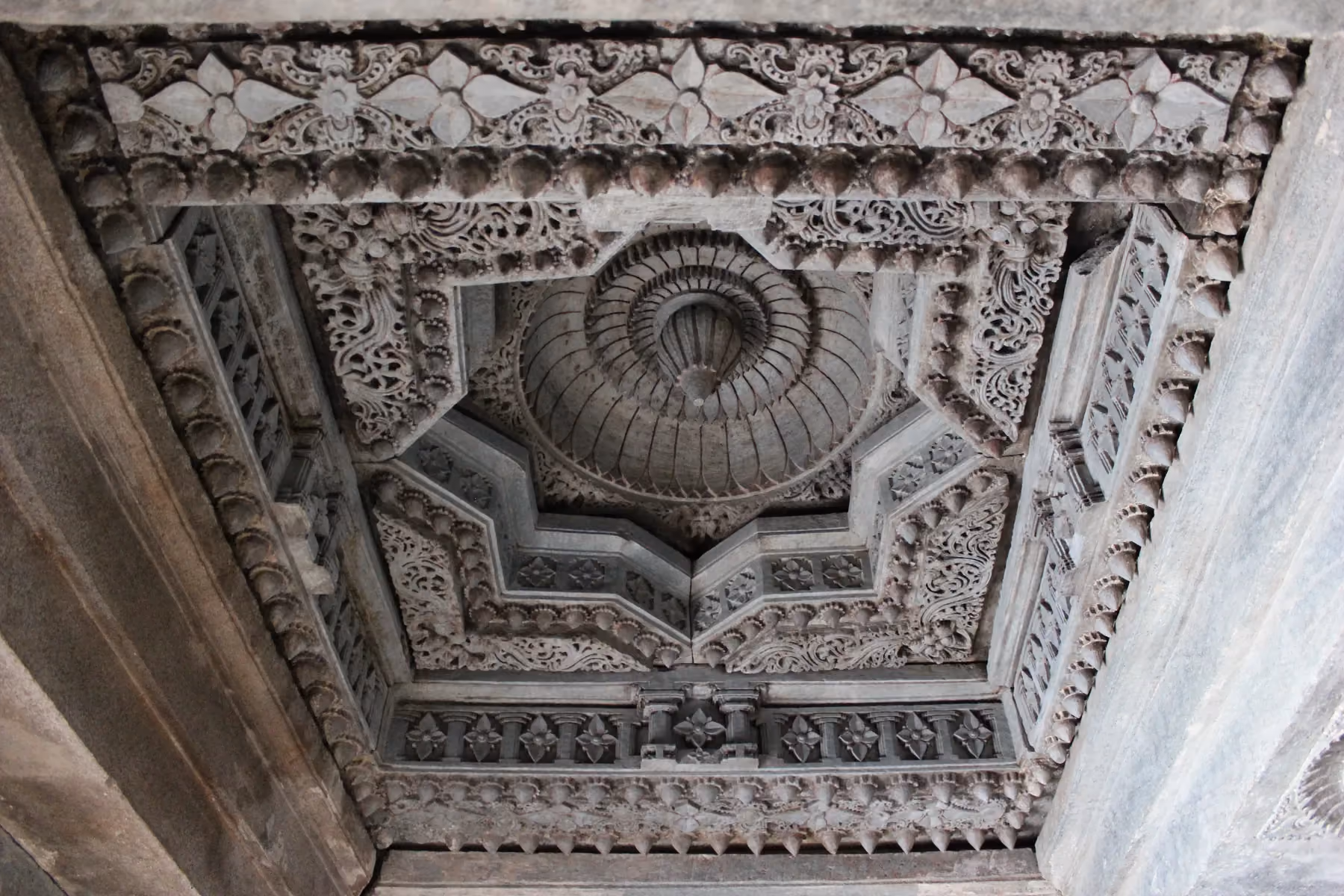 The carved stone ceiling of the mantapa at Akkana Basadi, a Jain temple in Shravanabelagola