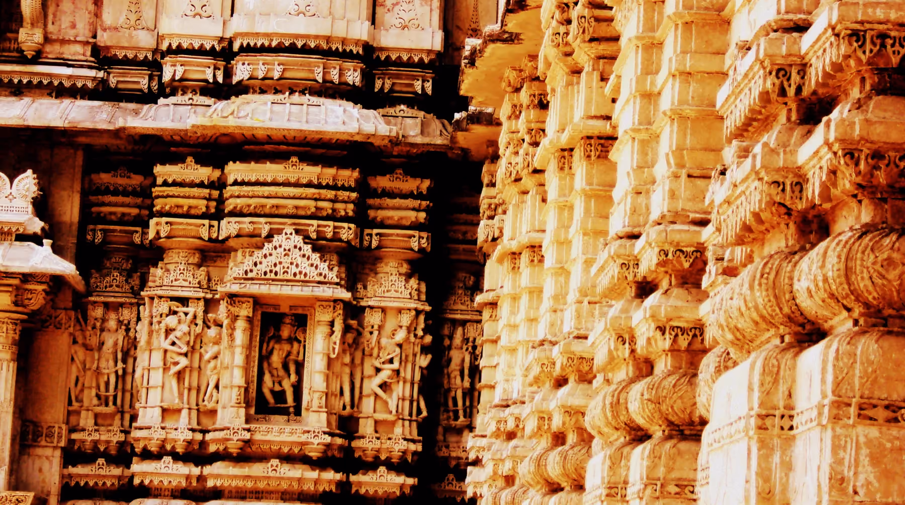 The columned facade and domes of the Hutheesing Jain temple in Ahmedabad, built in white marble