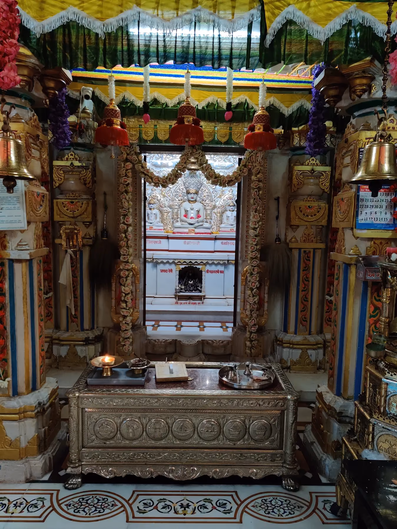 The white shikhara and facade of the Adinath Jain temple at Goregaon in Mumbai